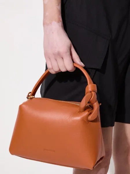 Δερμάτινη τσάντα JW Anderson The Jwa Small Corner Bag καφέ