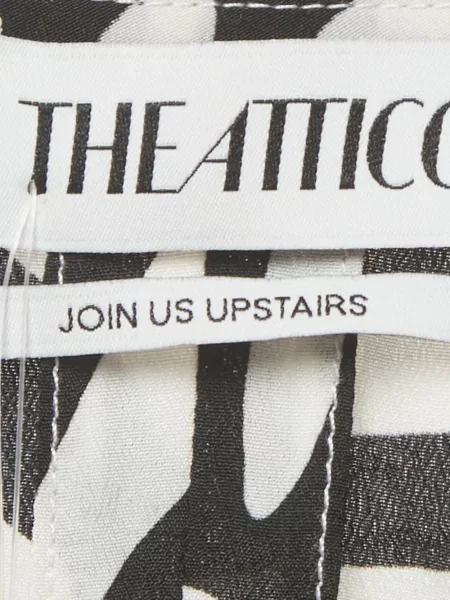 Ζεβρε μίνι φόρεμα The Attico με σχέδιο κρουαζέ μαύρο
