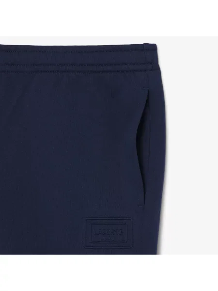 Lacoste Spodnie Dresowe Unisex Tapered Fit granatowe
