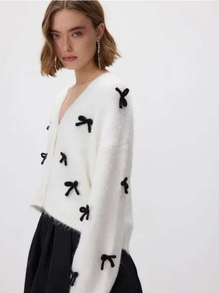 Reserved Светр із бантиками нюдовий 