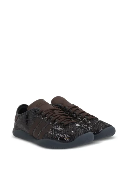 Pantaloni Adidas cu imagine cu model leopard maro