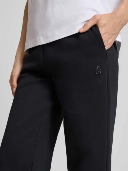 Spodnie dresowe z elastycznym pasem i nadrukiem z logo Armani Exchange czarny