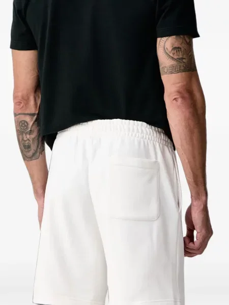 Pantaloni scurți Lacoste din fleece alb