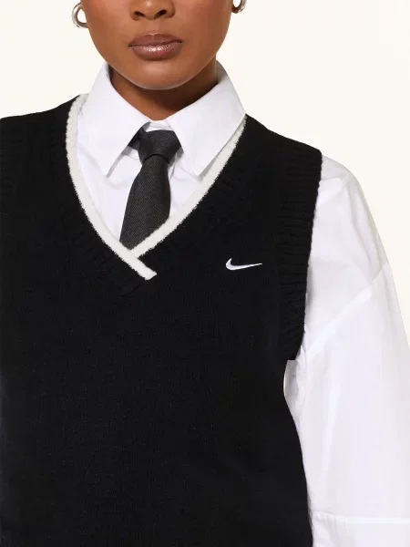 Vesta Nike bílá
