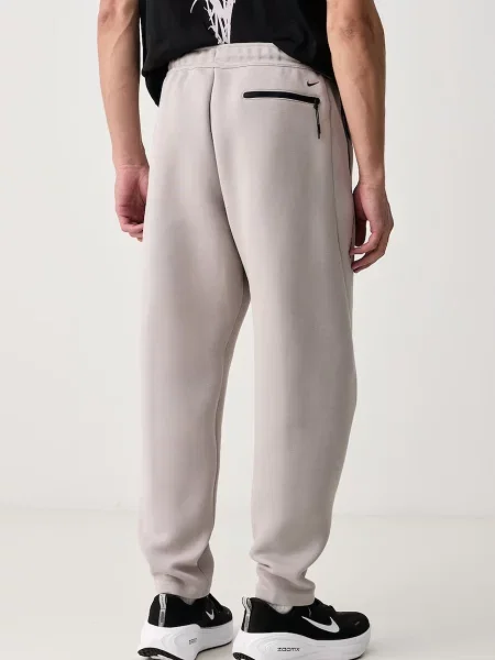 Sportnadrág Nike Sportswear bézs