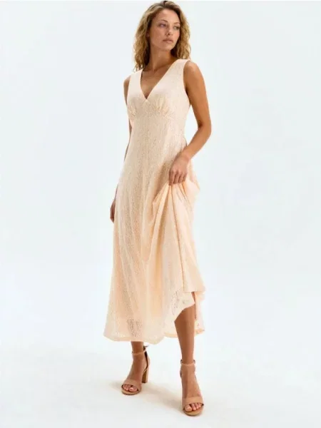 Розкльошена сукня міді з паєтками нюдовий