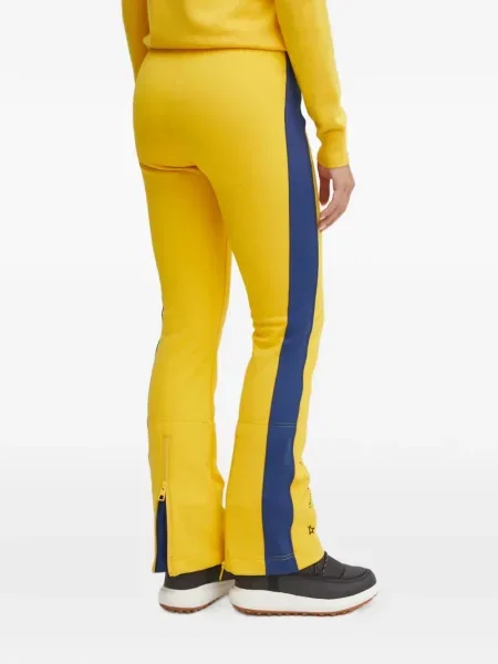 Jeździć na nartach spodnie dresowe Rossignol w paski żółte