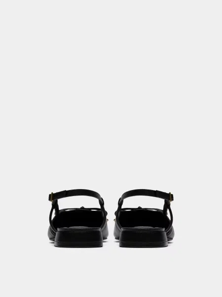 Кожаные мюли Clarks с бантом черные