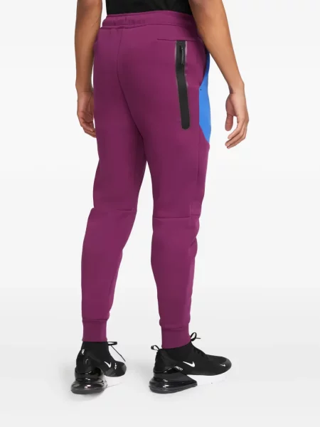 Fleecové běžecké kraťasy Nike s vázáním červené