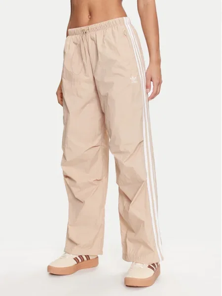 Adidas Pantaloni trening Woven Parachute bej