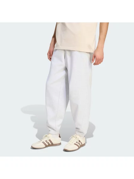 SPODNIE O STANDARDOWYM KROJU Z MAŁYM LOGO I MANKIETAMI ADIDAS KIT szare