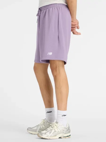Спортивні шорти New Balance SPORT ESSENTIALS FRENCH TERRY бавовна/перероблений фіолетовий