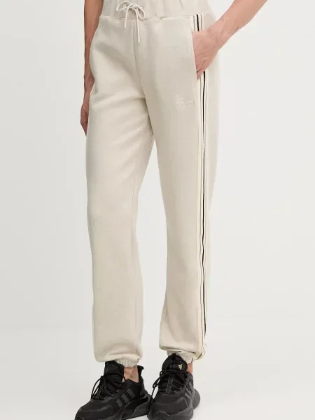 Guess spodnie dresowe z domieszką wełny MURIEL z aplikacją beżowy