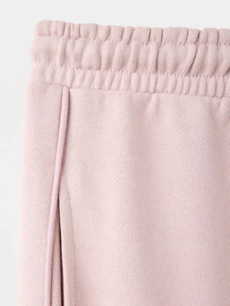 Spodnie jogger z szerokimi nogawkami Dzieci lata MANGO KIDS różowy