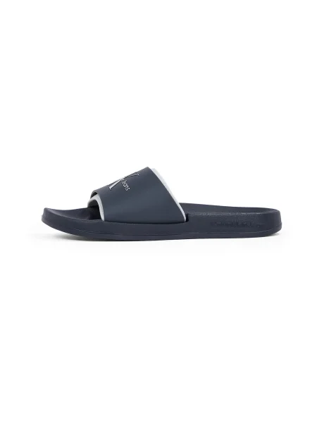 Natikači Calvin Klein Jeans Slide Rubber Neoprene Monologo Mornarsko modra