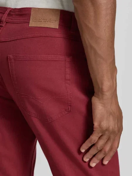 Jeansy o kroju slim fit w 5 kieszeni Christian Berg Men