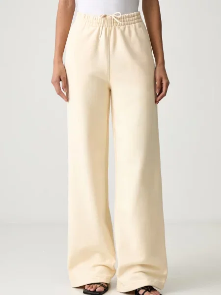Adidas Originals pantaloni de trening pentru femei cu Essentials galben