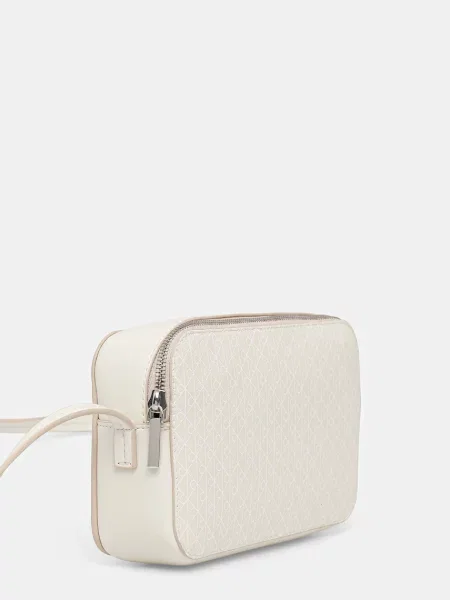Ročna torba Calvin Klein Emblem Aop Elongated Camera Bag Écru bež