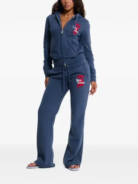 Trčanje hlače Juicy Couture s printom lepršave plava