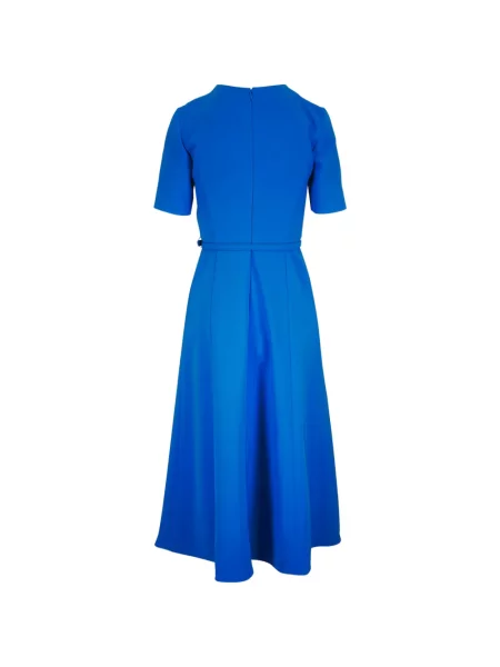 Rochie Carolina Herrera drapată de costum albastru
