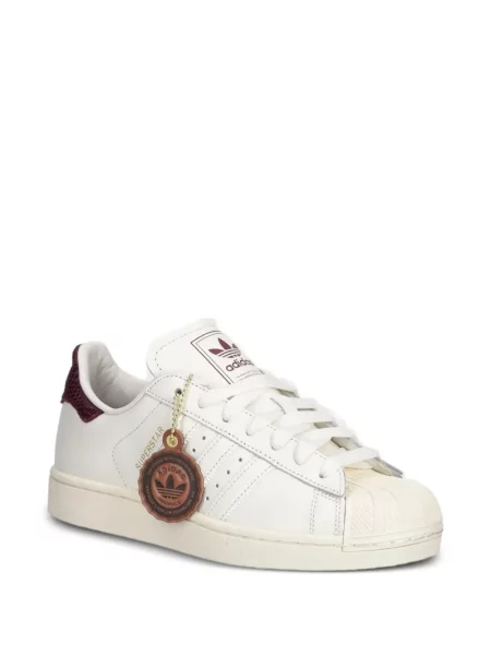 Decupat geacă Adidas cu glugă cu model piele de șarpe alb