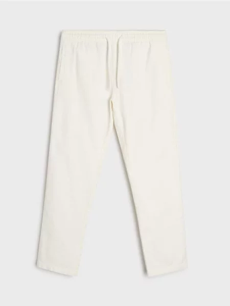 Sinsay Spodnie chino jogger kremowy