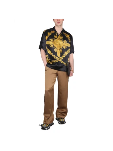Spodnie Versace brązowe