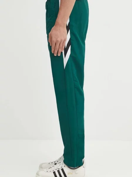 Спортивні штани adidas Originals Track Pant з аплікацією зелений