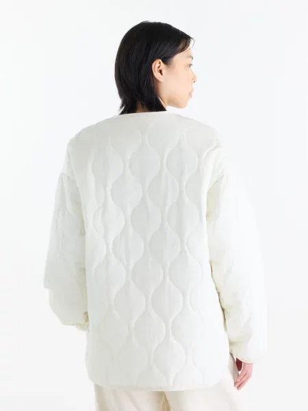Бомбер New Balance Quilted Bomber білий