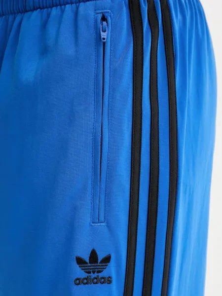 Спортивні штани adidas Originals Firebird з аплікацією
