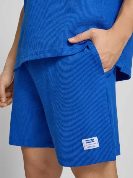 Szorty dresowe o kroju regular fit z mieszanka bawełny model NUWAFFLO' Hugo Blue niebieskie