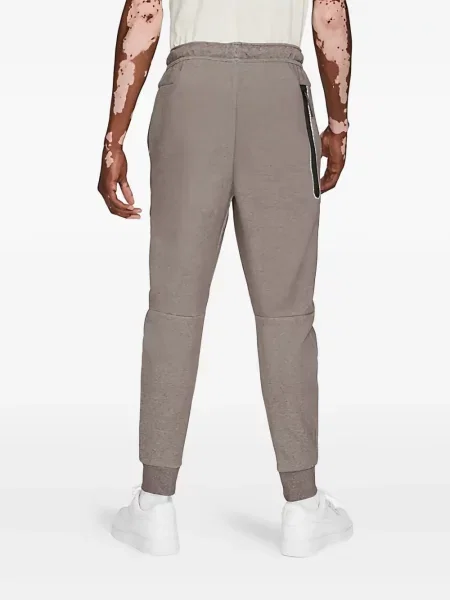 Fleecové běžecké kraťasy Nike s vázáním červené