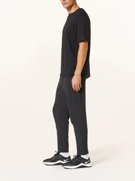 Nike Spodnie Treningowe Dri-Fit Unlimited schwarz czarne