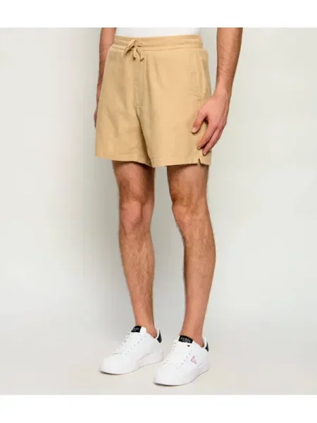 Tommy Jeans Rövidnadrág | Relaxed fit len hozzáadásával bézs