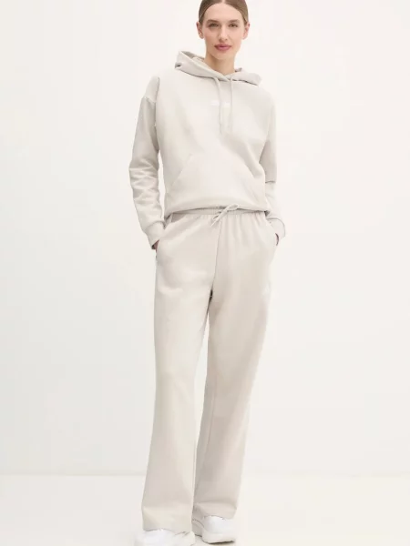 Спортивні штани adidas Essentials візерунок бежевий