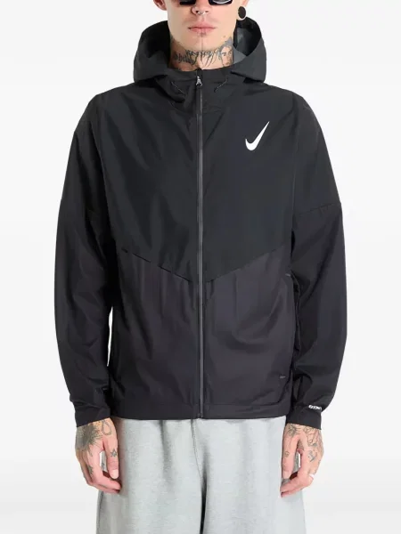 Top sportowy Nike prążkowany niebieski