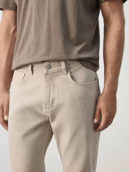 Jeansy Ben cropped tapered fit Mężczyzna 44 MANGO MAN beżowy