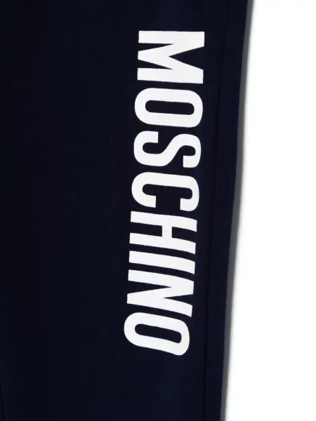 Spodnie dziecięce Moschino niebieskie