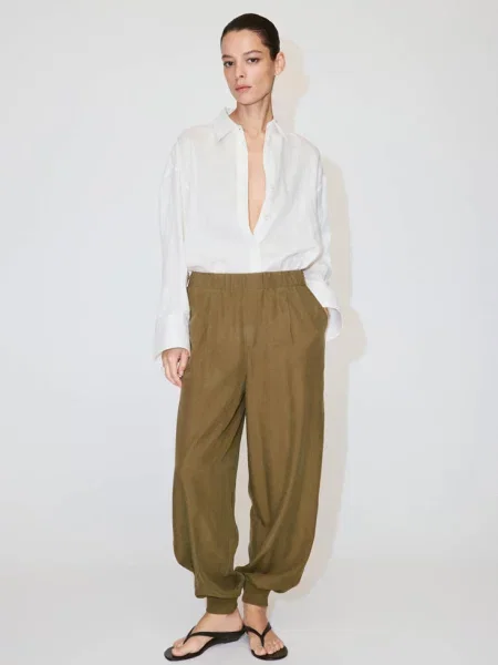 Spodnie haremki z lyocellu khaki Kobieta XS MANGO