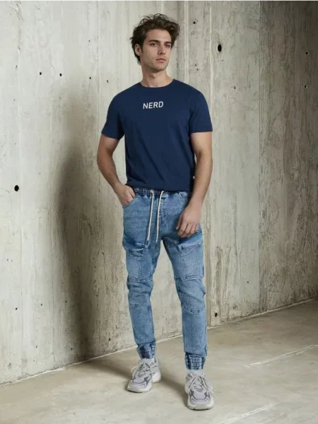 Sinsay Kalhoty Jogger slim fit námořnická modrá