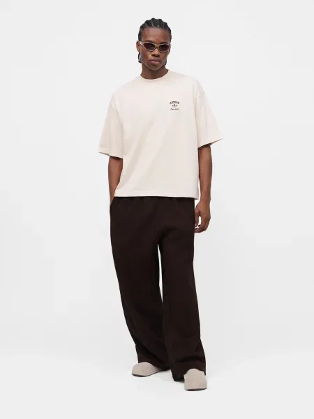 ADIDAS ORIGINALS Nohavice ESS tmavohnedá