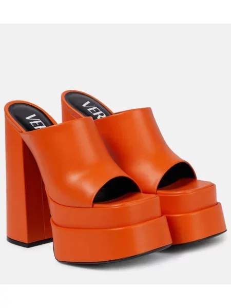 Usnjene mules Versace s platformo oranžna