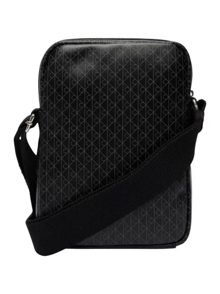 Geantă crossover Calvin Klein Emblem Aop Coated Slim Reporter negru