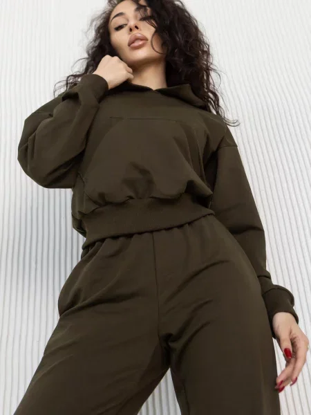 Женский спортивный костюм с капюшоном зелений