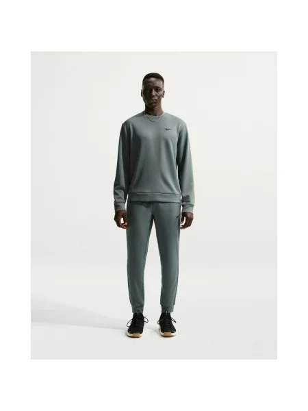 Długie spodnie Nike Hyverse Fleece UV Dri-FIT zielono S szare