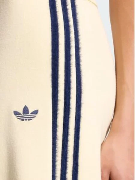 Adidas Spodnji del trenirke Firebird Kremna rumena