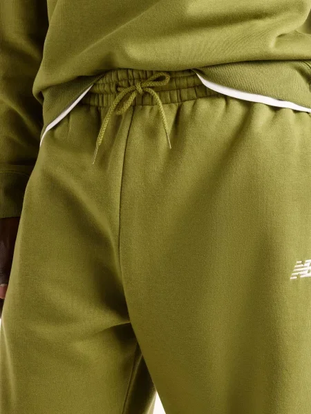 Флісові спортивні штани New Balance зелені
