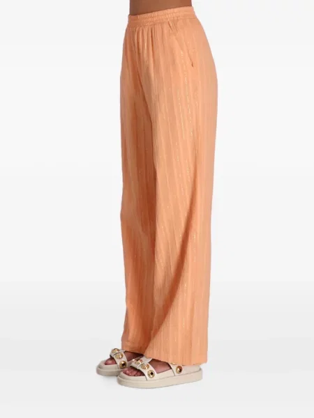 Spodnie Devotion pomarańczowe