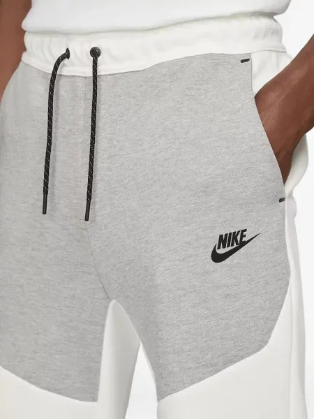 Pantaloni Nike din fleece alergare cu broderie negru