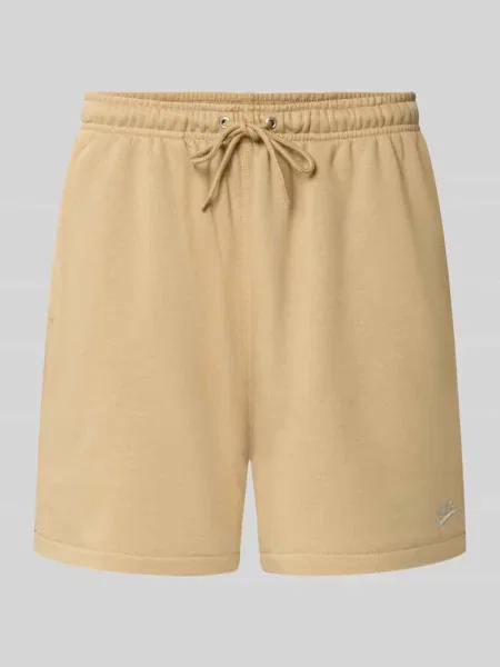 Szorty dresowe o kroju regular fit z mieszanka bawełny Nike beżowe